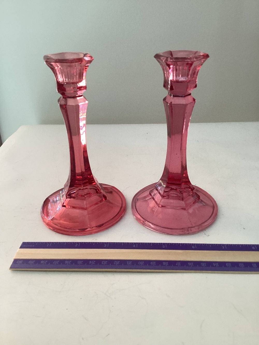 Pair of deep pink Indiana Glass candleholders, 6 inches tall